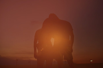 Fototapeta na wymiar Couple Man and Woman Hugging in Love,silhouette of romantic lover.