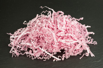 heap of pink shredded paper