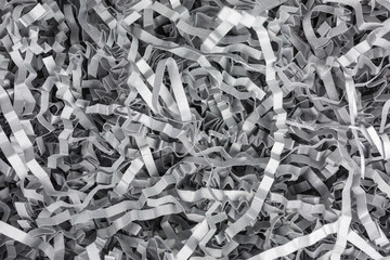 background of gray shredded paper