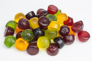 heap of gummy candy with different fruit flavors