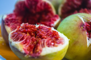 Ripe figs fruit on a plate, close up