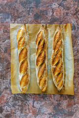 Freshly baked artisanal baguettes.