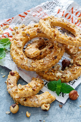 Shortbread in the shape of a ring with hazelnut.