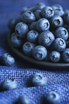 Plate of blueberries close up