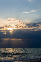 Amazing sea sunset, the sun, waves, clouds