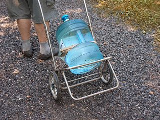 trolley with bottle of water