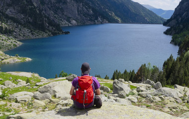 Man doing sports in the national park of AigÃ¼estortes and Lake San Mauricio, Lleida