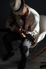 musician playing the guitar