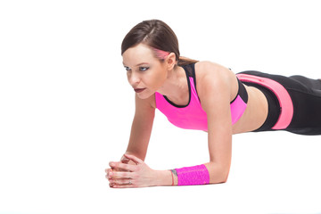 Fototapeta premium one woman exercising workout fitness aerobic exercise on studio isolated white background. Perfect plank.