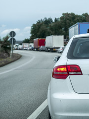 Fototapeta premium Rosalina, Italy - July, 11, 2018: traffic jam on a country road in Rosolina, Italy