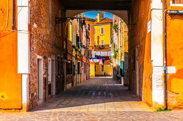 Fototapeta na wymiar Venetian Ally way in Venice, Italy