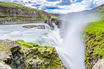 Long esposure at Gullfoss waterfall, in the canyon of Hvítá river in southwest Iceland. A thin mist rises from the waterfall, moved by a light breeze. A beautiful places in the "golden circle"