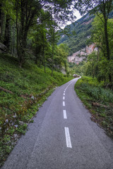Fototapeta na wymiar Alpine landscape with the image of road
