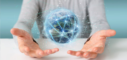Fototapeta premium Man holding Connection around a world globe isolated 3d rendering