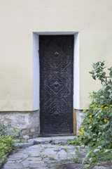 Photo of antique vintage old style forged decorated door