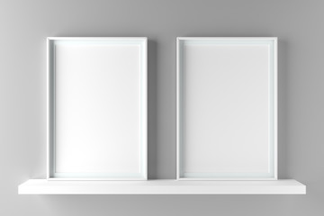 Two elegant frames stand on the shelf. 3D render