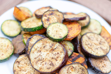 Grilled vegetables on a white plate 