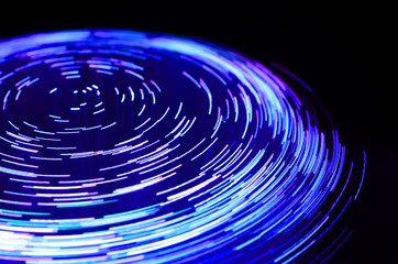 purple and blue vortex effect created with fiber optic light source