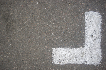 Angle of paint on the asphalt