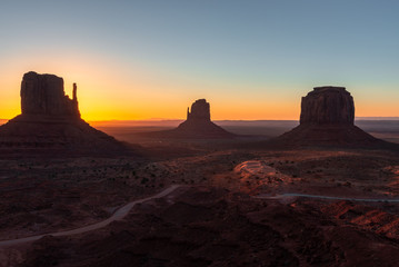 East and West Mitten Buttes, and Merrick Butte at sunrise, Monument Valley Navajo Tribal Park on the Arizona-Utah border, USA