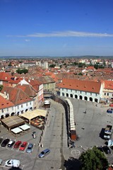 Obraz premium Small Square and red roofs top view in Sibiu city, Romania from the Tower of Council
