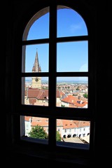 Evangelist Cathedral  and red roofs top view through window