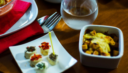 Set with different appetizers in small portions, healthy and delicious snacks