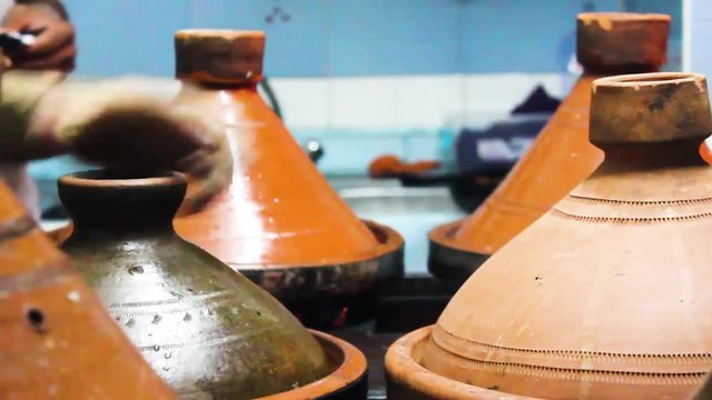 Cook Cooking Tagines in Essaouira Morocco