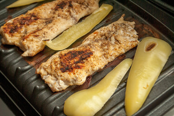 chicken meat and sweet pepper grilling