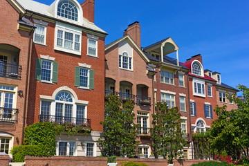 Modern houses facing Old Town Alexandria waterfront in Virginia, USA. Highly sought after residential development in Alexandria neighborhood. - obrazy, fototapety, plakaty