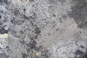fragment of the old textured gray cement wall