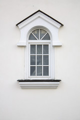 Photo of old cozy single window on old wall