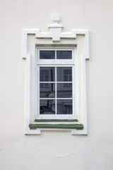 Fototapeta na wymiar Photo of old cozy single window on old wall