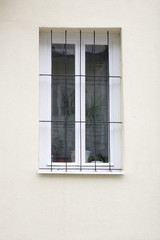 Fototapeta premium A window with a lattice of an ancient building