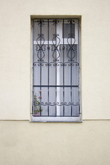 Obraz premium A window with a lattice of an ancient building