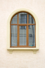 Photo of old cozy single window on old wall