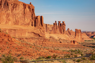 The famous red slickrock 3 Gossips formation found along the Park Avenue Trail in Arches National Park