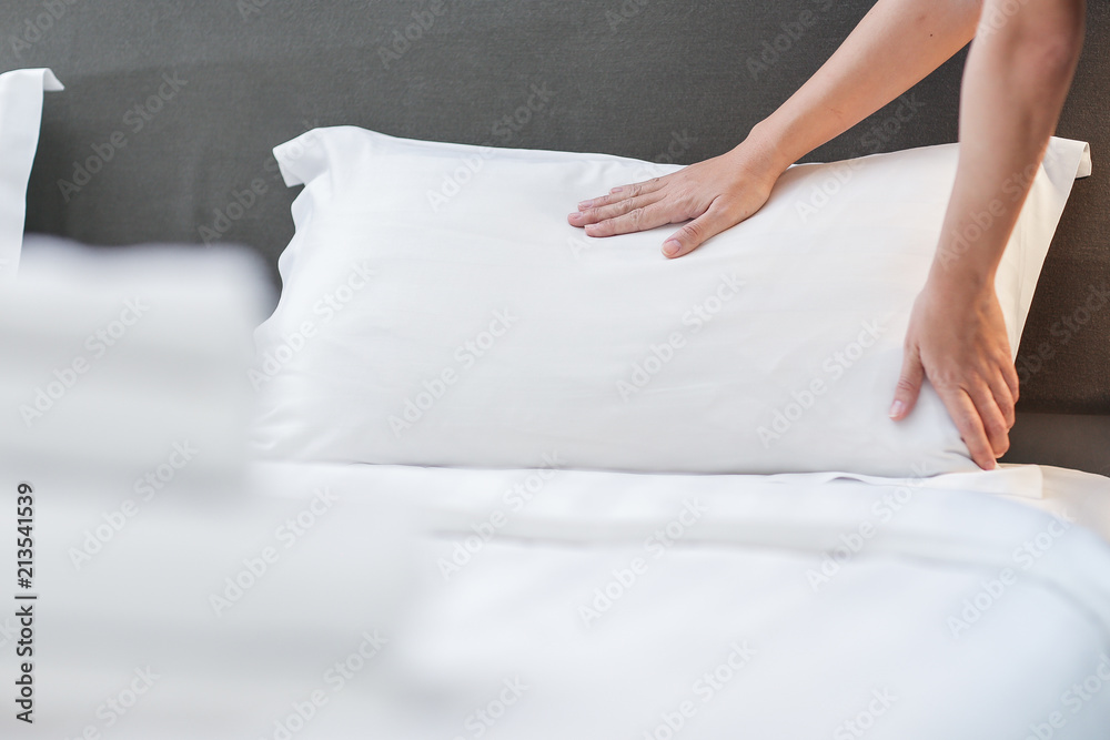 Wall mural Hands Making Bed from Hotel Room Service