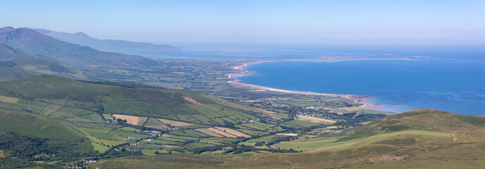 Summer view looking west along the Dingle Peninsula from Caherconree towards the Maharees and...