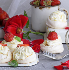 baked meringue with cream and fresh strawberries