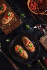Italian bruschetta on dark background