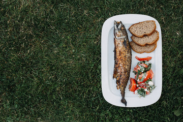 Grilled mackerel with 100% rie bread slices and tomato salad with feta cheese and organic basil...