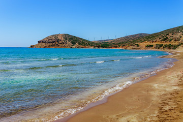 Scenic beach in Prasonisi on Rhodes island, Dodecanese, Greece. Panorama with nice sand beach and clear blue water. Famous tourist destination in South Europe