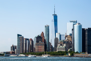 New York City / USA - JUL 14 2018: Lower Manhattan Skyline view from Governors Island ferry on a...