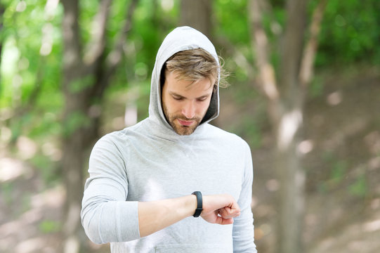 digital fitness. modern fitness is digital. man with fitness bracelet. digital marketing in sport. digital technology in modern life and fitness. technologies make training easier