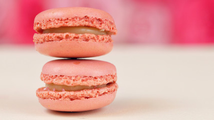 Macro close up of colourful macaron cookies with copy space.