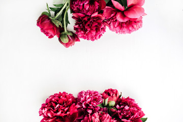 Summer composition with pink peony flowers bouquet on white background. Flat lay, top view blog hero header.