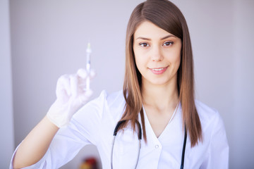 Clinic. Cheerful Doctor working at her office