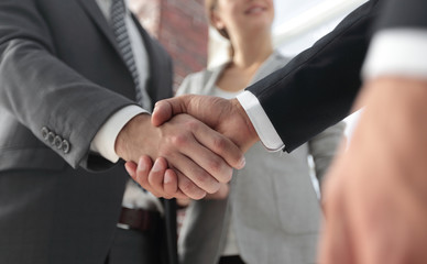 friendly handshake of business people.