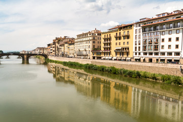 Fototapeta na wymiar Arno River through Florence Italy